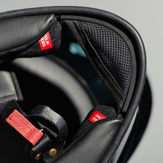 Close up view of chin strap and vent on Hedon Psilo Explorer Helmet - Signature Black