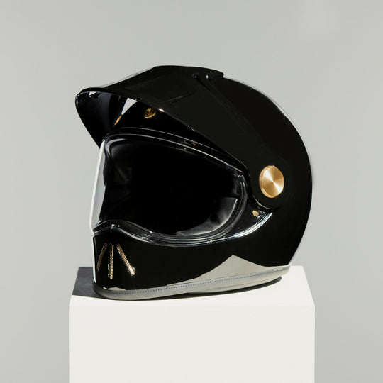 Front left view of Hedon Psilo Explorer Helmet - Signature Black with clear visor down