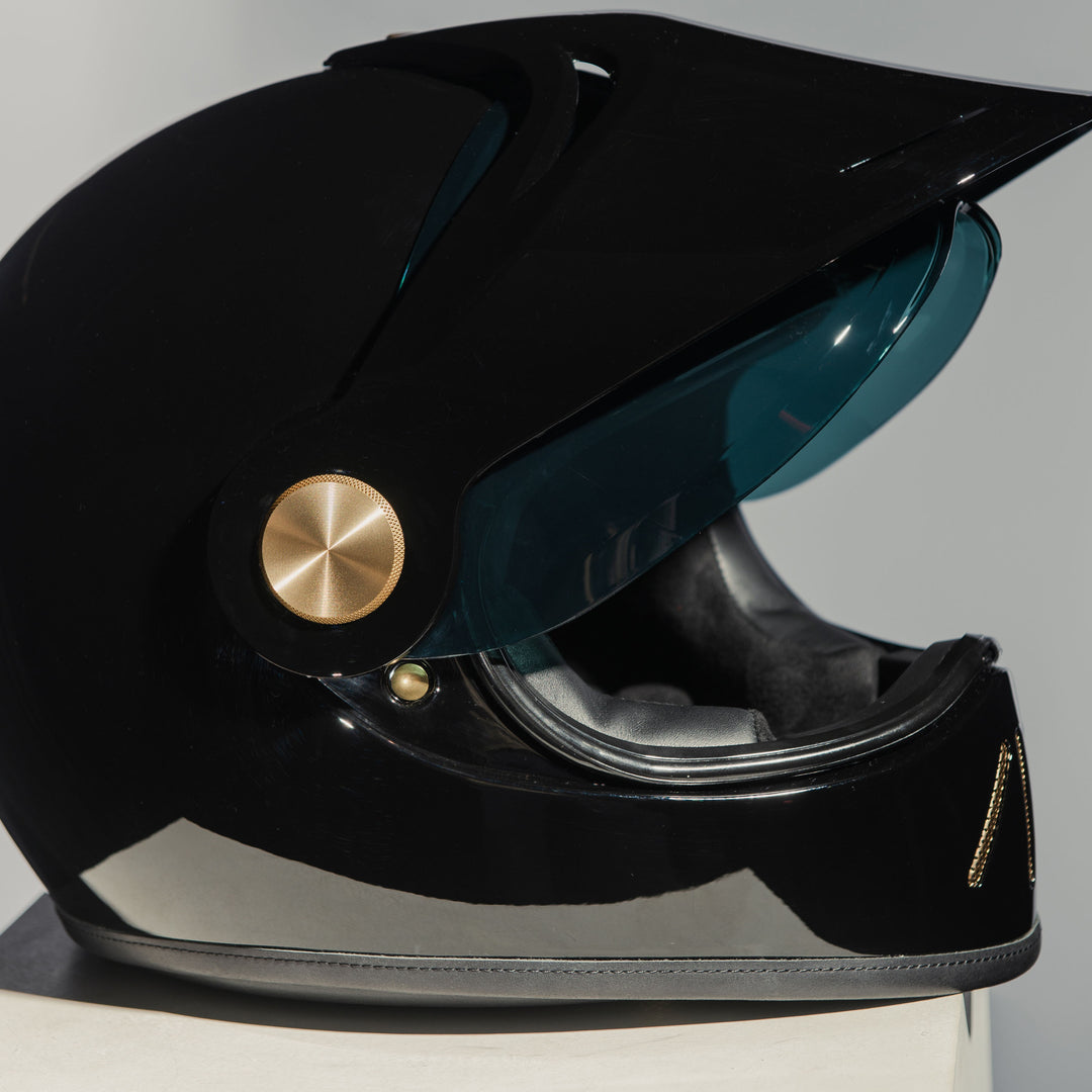 Right side view of Hedon Psilo Explorer Helmet - Signature Black with tinted visor open