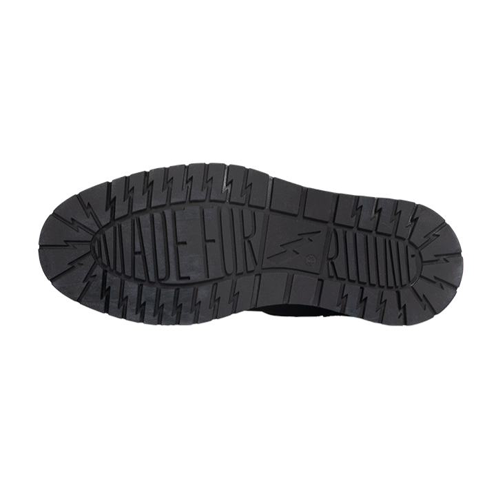 Underside of black John Doe Rover motorcycle boot showing MADE FOR RIDE tread pattern