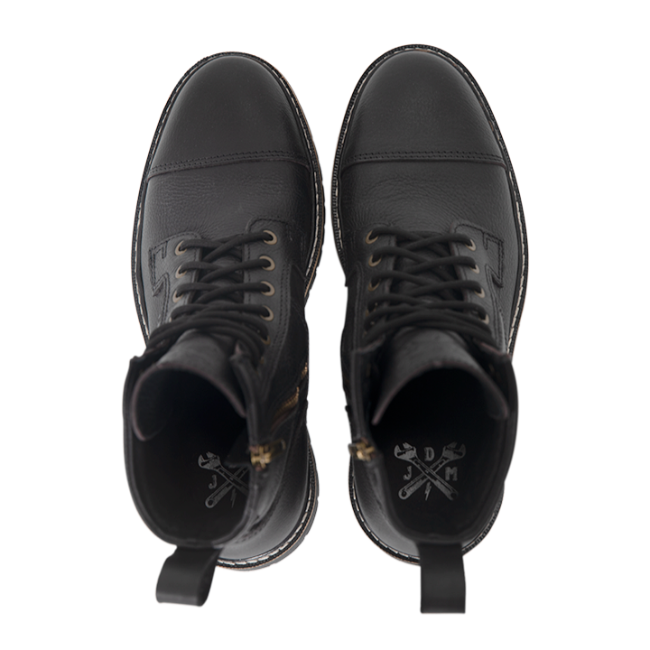 Top-down view of black John Doe Rover motorcycle boots showing branded insoles and laces