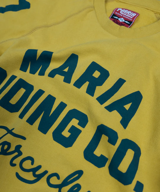 maria-riding-mustrad-yellow-spades-sweatshirt-close-up-front-print