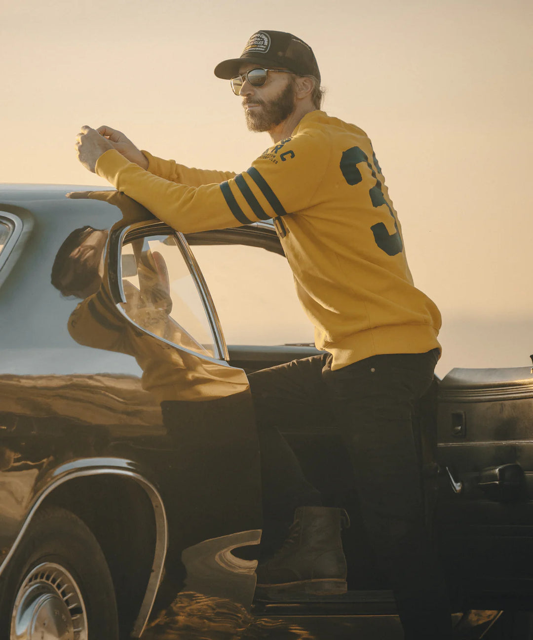 maria-riding-mustrad-yellow-spades-sweatshirt-model-back-2