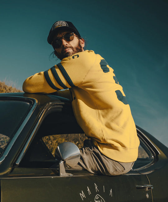 maria-riding-mustrad-yellow-spades-sweatshirt-model-back