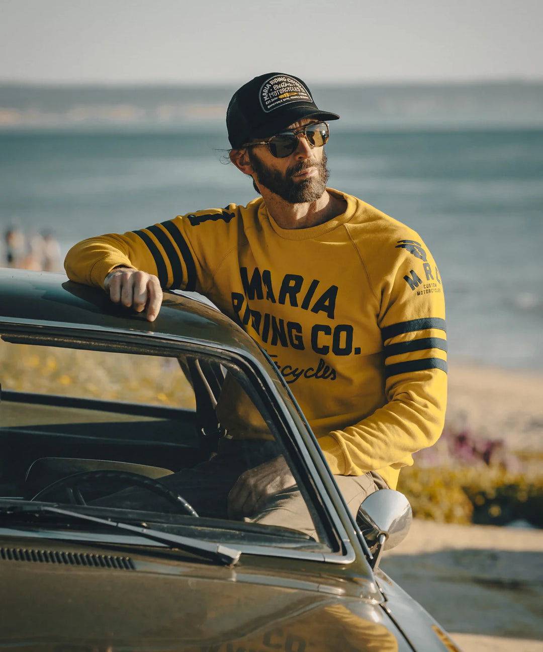 maria-riding-mustrad-yellow-spades-sweatshirt-model-front-2