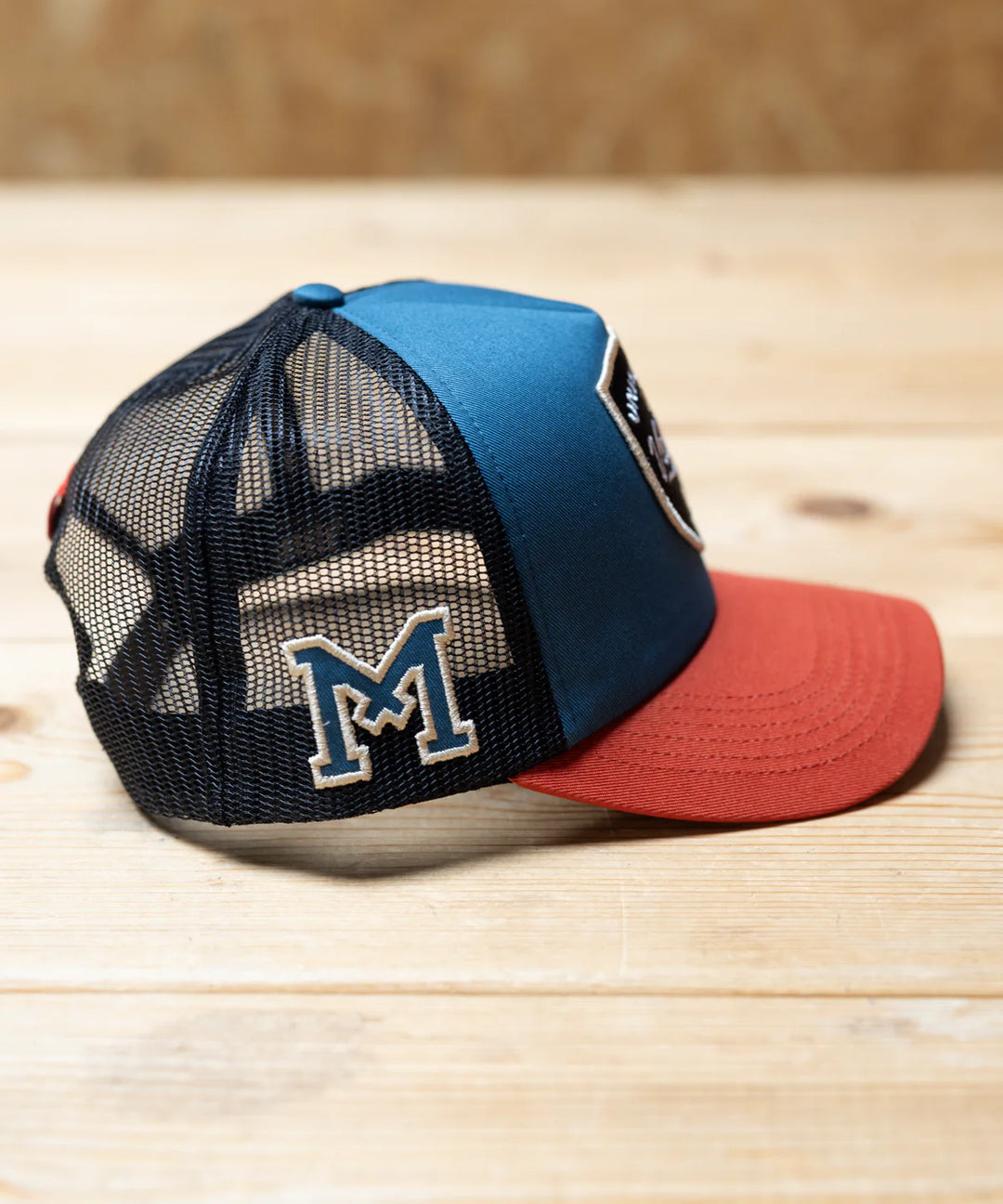 University of Velocity Trucker Cap