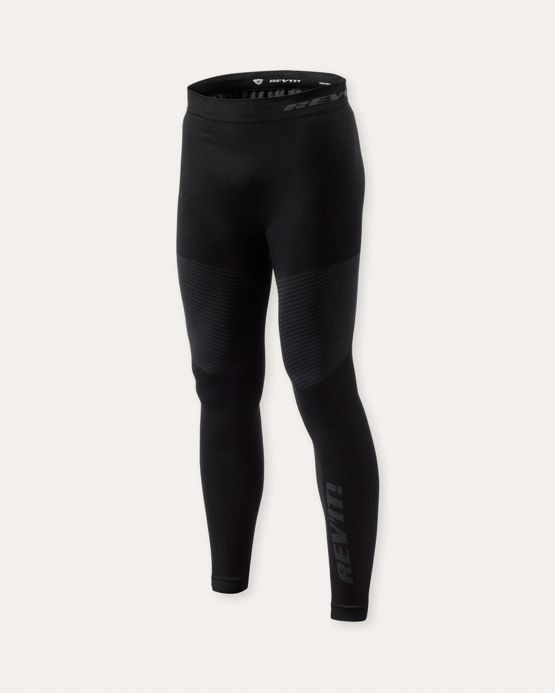 Black technical base layer leggings with compression fit and reinforced knee panels