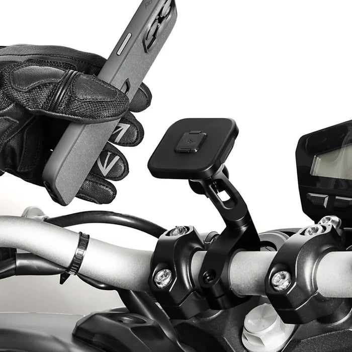 Peak Design motorcycle bar mount non-charging installed on handlebars, phone being attached