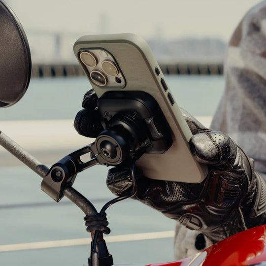 Peak Design motorcycle mirror mount with charging holding smartphone