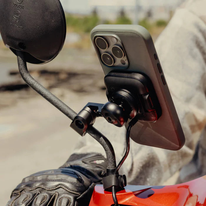 Peak Design motorcycle mirror mount with charging holding smartphone