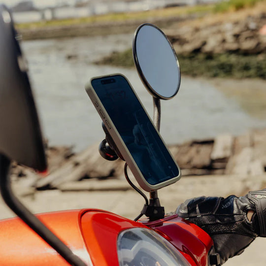 Peak Design motorcycle mirror mount with charging installed on scooter