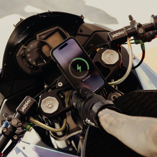 Peak Design motorcycle stem mount charging version installed in cockpit with phone charging