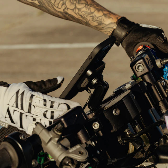 Peak Design motorcycle stem mount with charging head – rider cockpit view