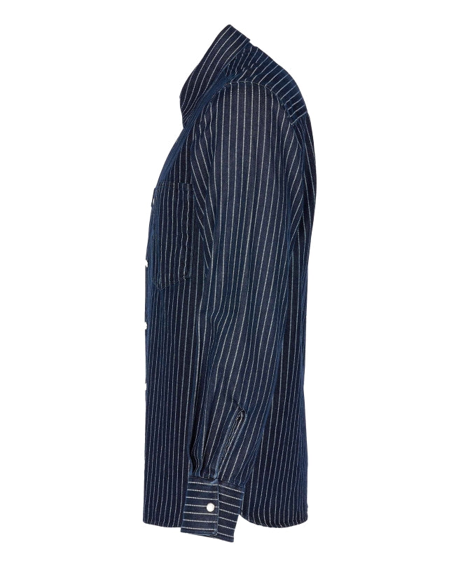 Side view of the Pike Brothers 1937 Roamer Shirt in blue Wabash denim.