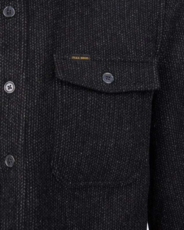 Close-up of the Pike Brothers 1943 CPO Shirt Atlanta Grey chest pocket and button detail
