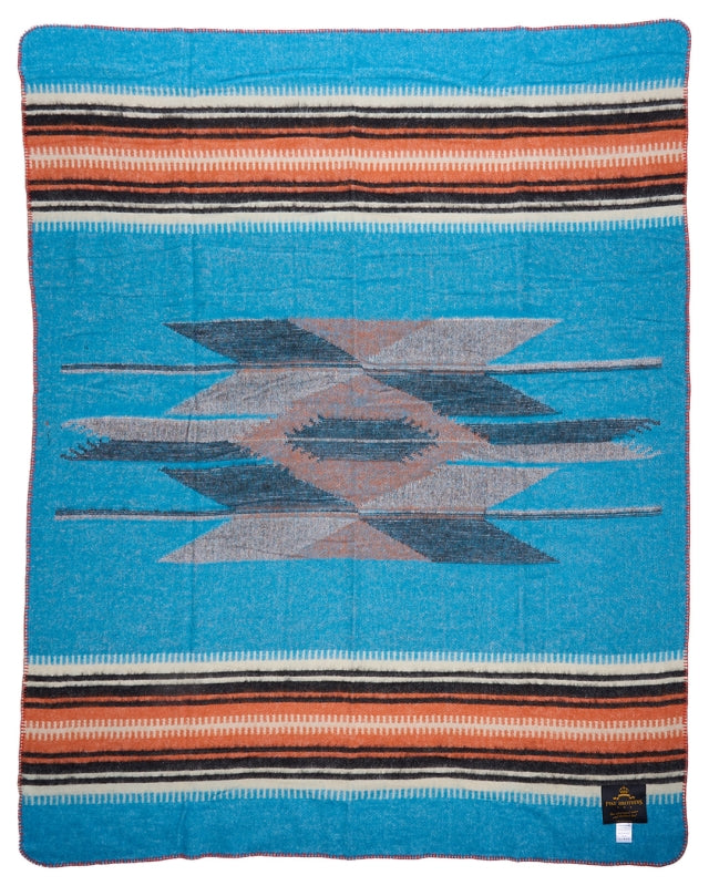 Pike Brothers 1969 La Mesa Blanket – reverse side featuring mostly blue and orange in Mexican-style textile pattern
