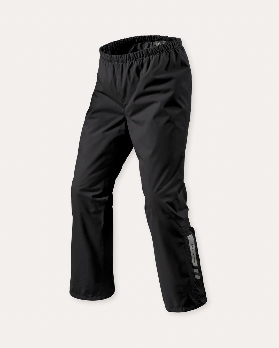 REV’IT! black waterproof motorcycle overpants with elastic waist and lightweight rain protection