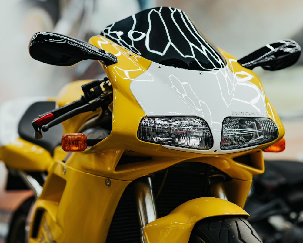 Restored Ducati 748 SP in yellow and white — example of custom styling available at Machinehead Moto