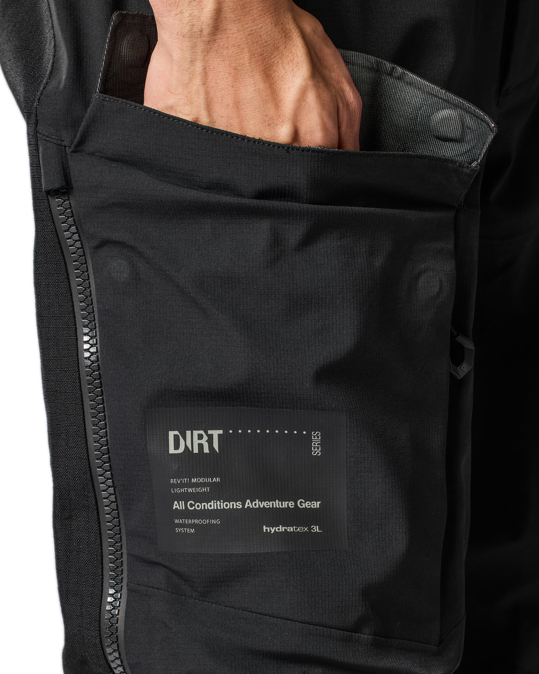 Close-up of pocket and zip detail on REV’IT Component 3 H2O pants
