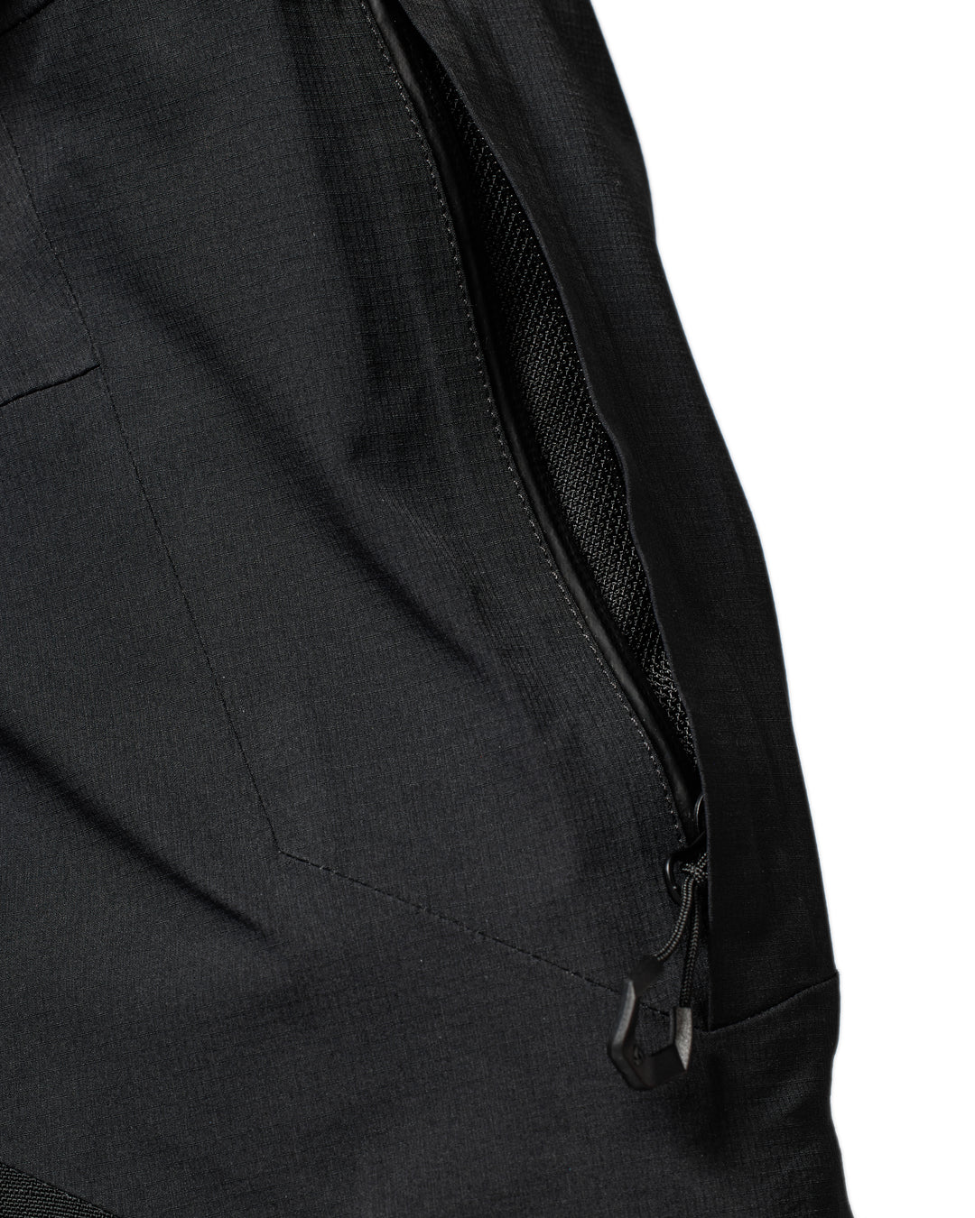 Close-up of ventilation zip on REV’IT Component 3 H2O pants in black