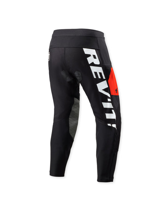 REV’IT! Lejano Motorcycle Trousers in black and red, rear three-quarter product view.
