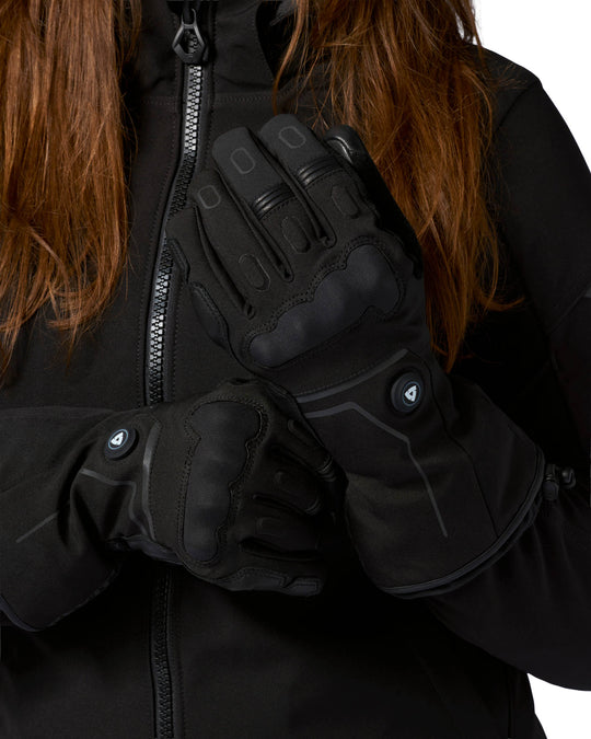 Model wearing REV’IT! Liberty 2 H2O Ladies Heated Motorcycle Gloves in black.
