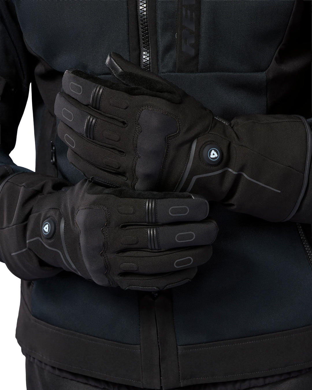 Model wearing REV’IT! Liberty 2 H2O Men’s Heated Motorcycle Gloves in black, front view.
