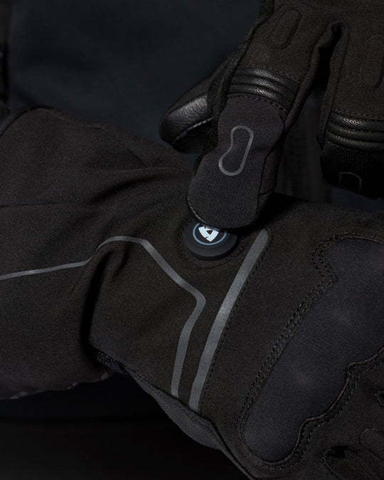 REV’IT! Liberty 2 H2O Men’s Heated Motorcycle Gloves in black, close-up heating control detail.
