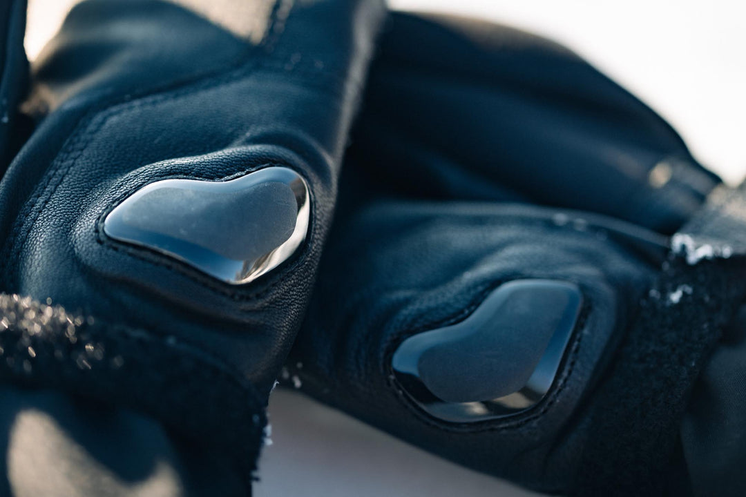 REV’IT! Liberty 2 H2O Men’s Heated Motorcycle Gloves in black, close-up knuckle protection detail.
