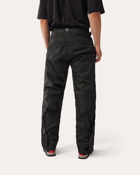 REV'IT! Sand 5 H2O black motorcycle trousers back view – waterproof adventure riding pants with CE protection
