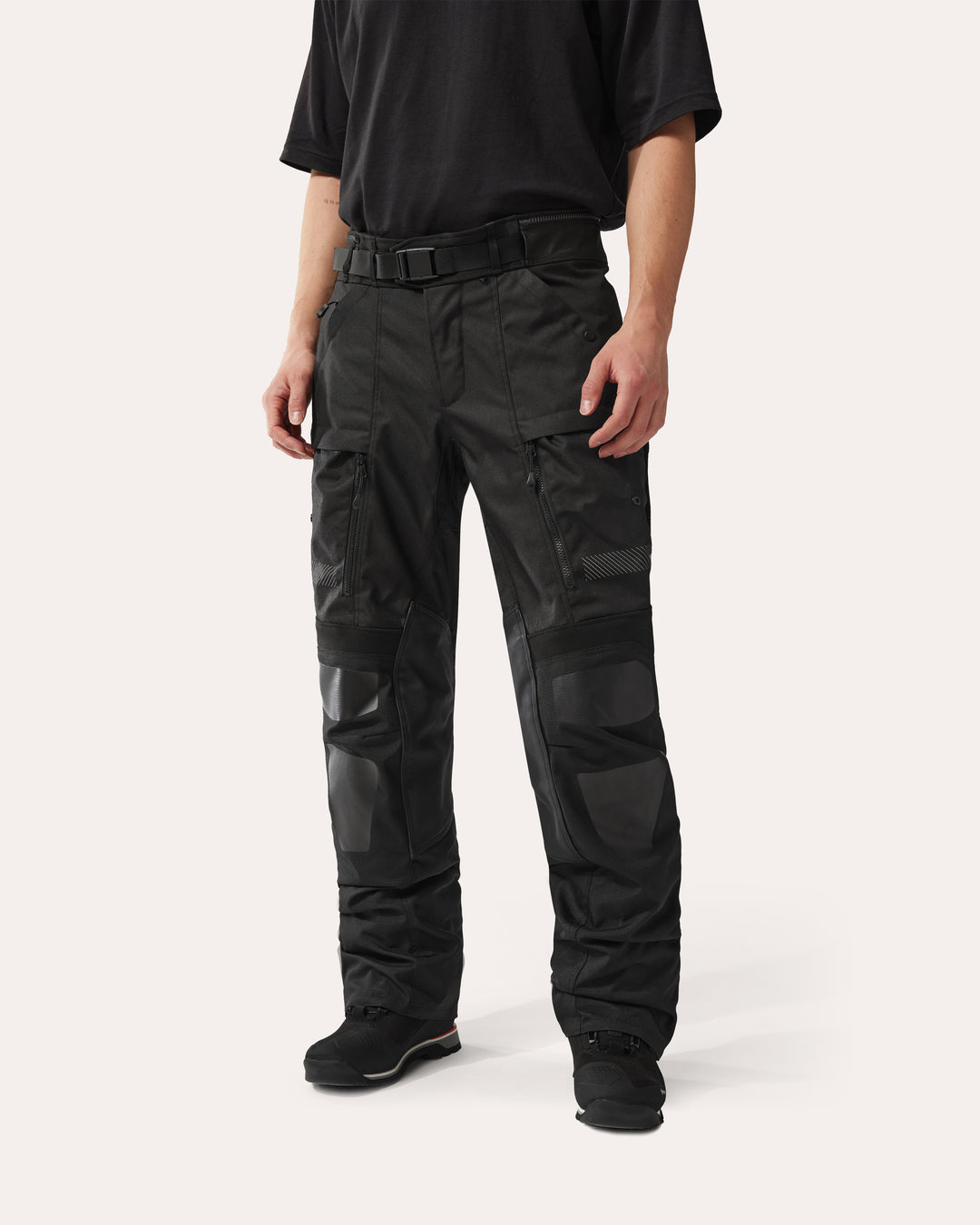 REV'IT! Sand 5 H2O black motorcycle trousers front view on model – waterproof adventure riding pants with CE protection