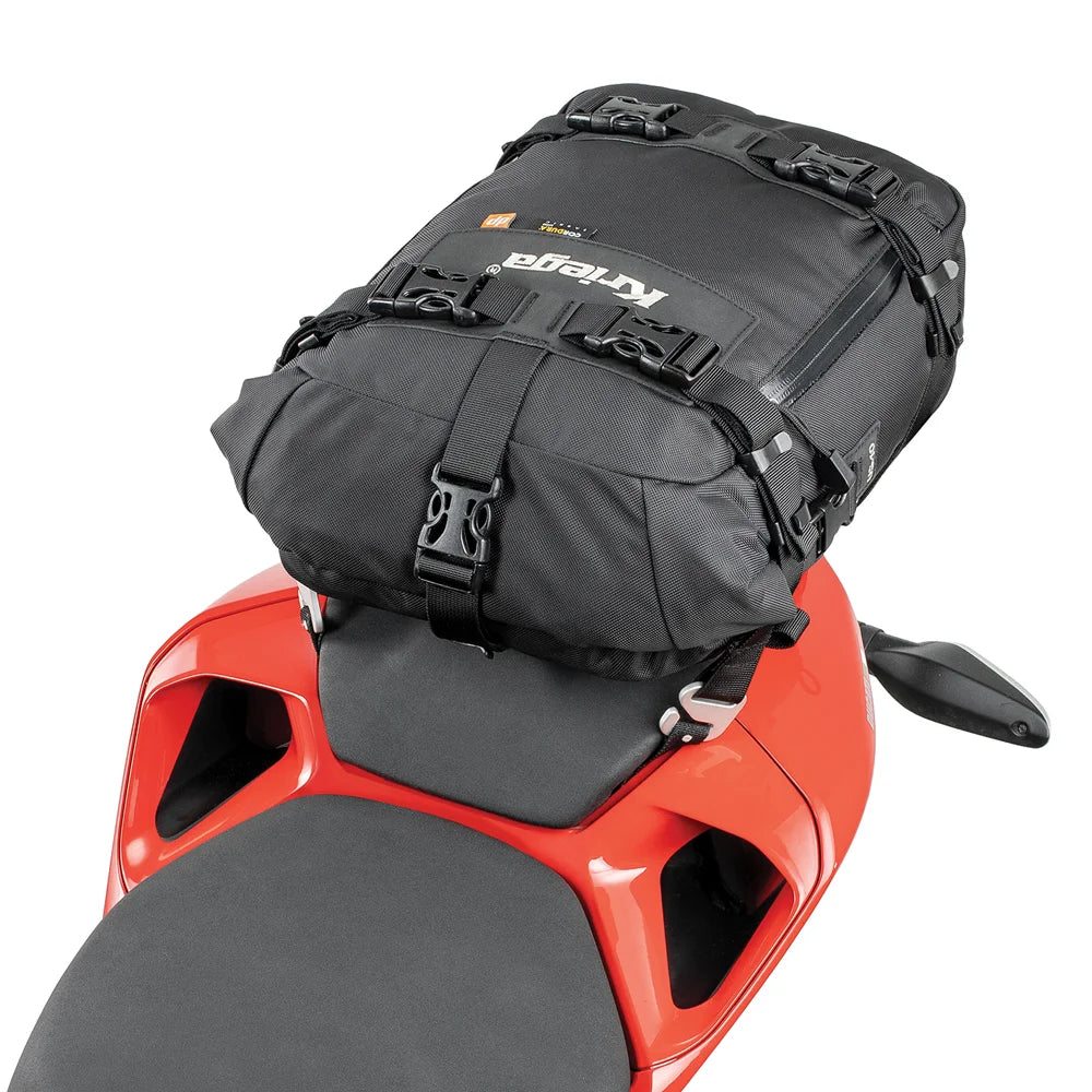 Kriega US-10 Drypack motorcycle luggage mounted on red Ducati tail seat, side view