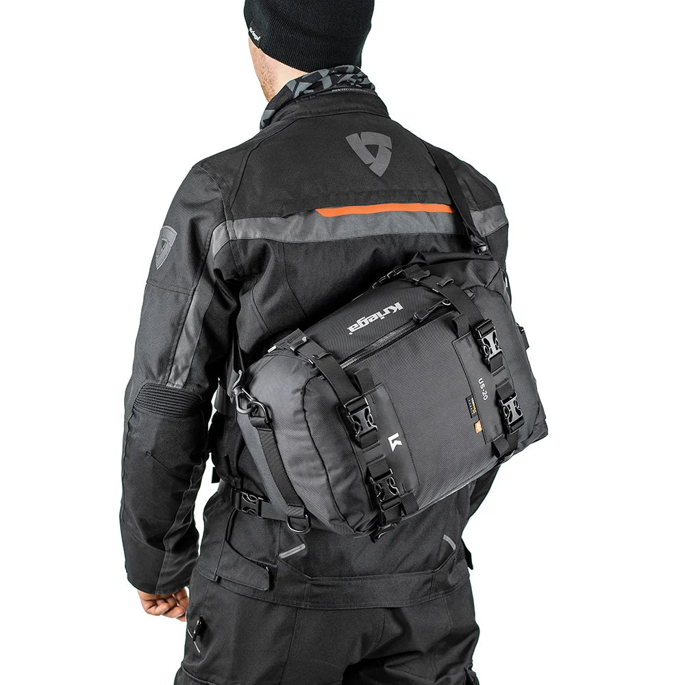 Rider wearing Kriega US-20 Drypack cross-body with Rev’it jacket
