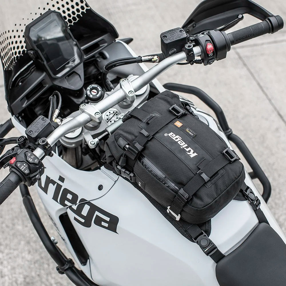 Kriega US-5 Drypack motorcycle bag mounted on Ducati DesertX fuel tank