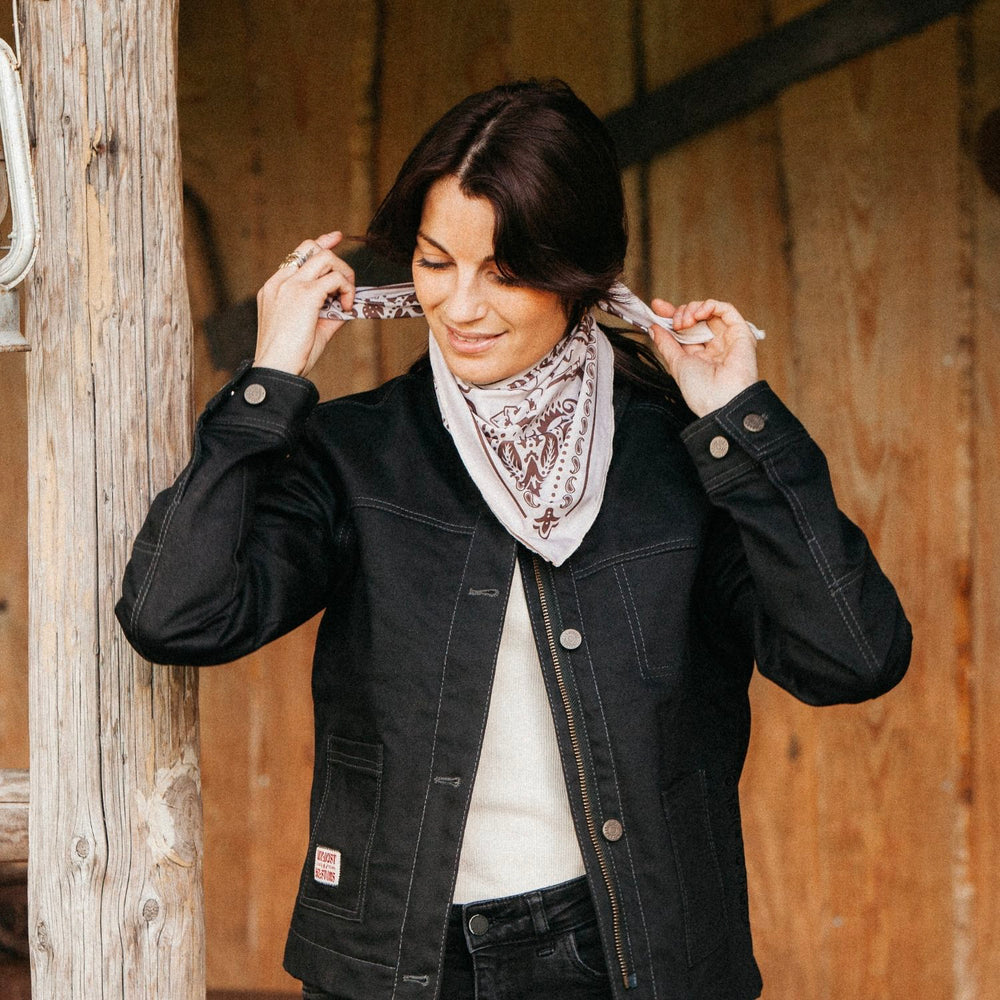 Rider adjusting Wildust Sisters Best in the West Scarf — soft Lycra motorcycle bandana