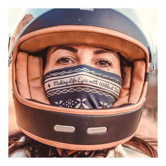 Wildust Sisters neck warmer epic black graphic print worn under helmet lifestyle image
