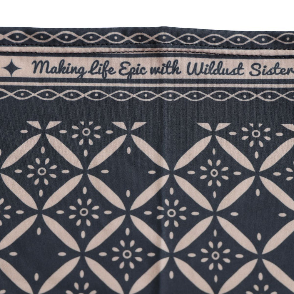 Wildust Sisters neckwarmer epic black graphic print close-up product detail view