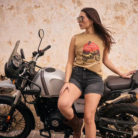 Wildust Sisters Take a Trip tank top women’s lifestyle image sitting on motorcycle with casual summer riding outfit