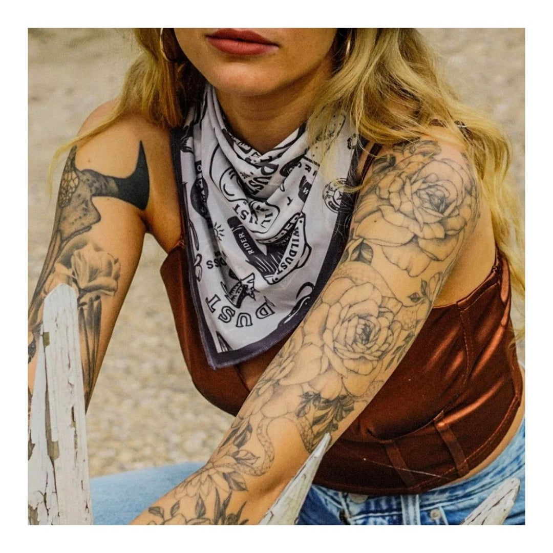 Wildust Sisters Wild Spirit motorcycle scarf grey graphic print worn neck close up lifestyle image